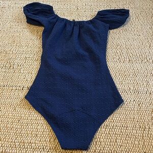 Lisa Marie Fernandez off the shoulder navy one piece swimsuit